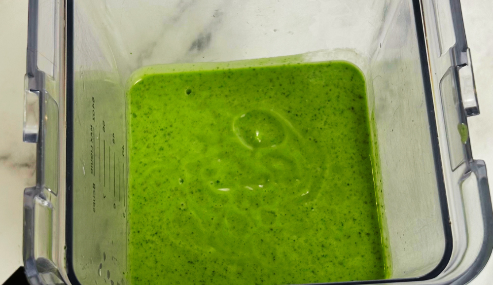 Healthy kale and avocado smoothie blended