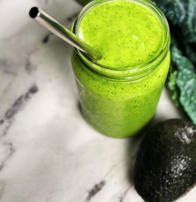 Healthy Kale and mango smoothie in a glass jar