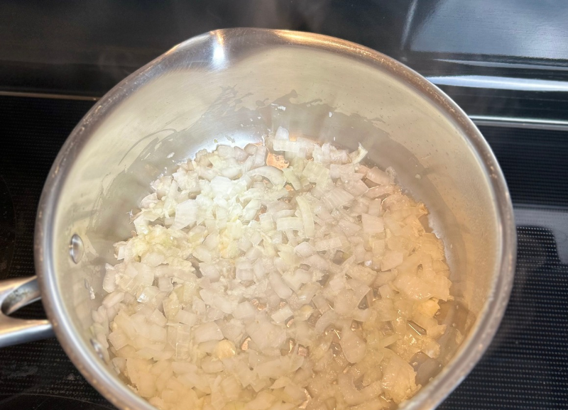 Cooked onion fot lentil and carrot soup