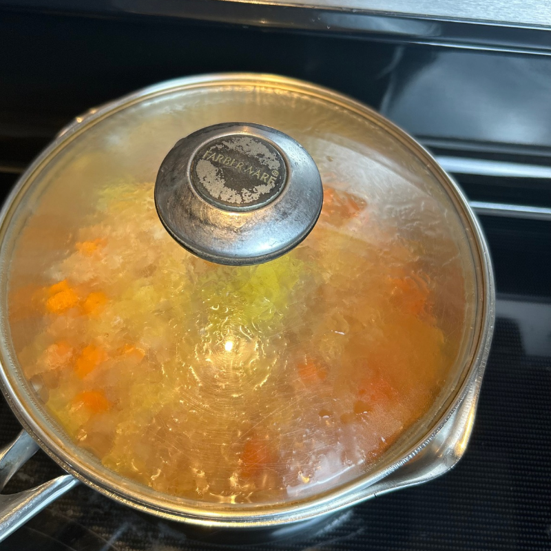 Lentil and carrot soup cooking